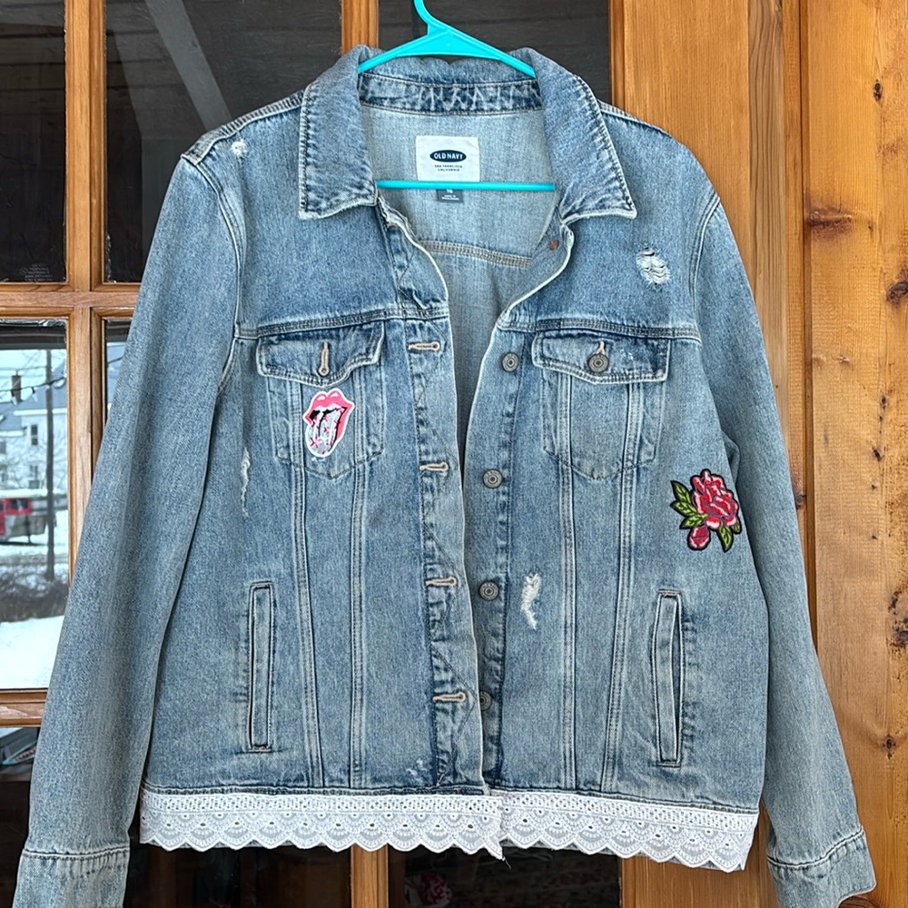 Distressed upcycled denim jacket, lace trim and patches